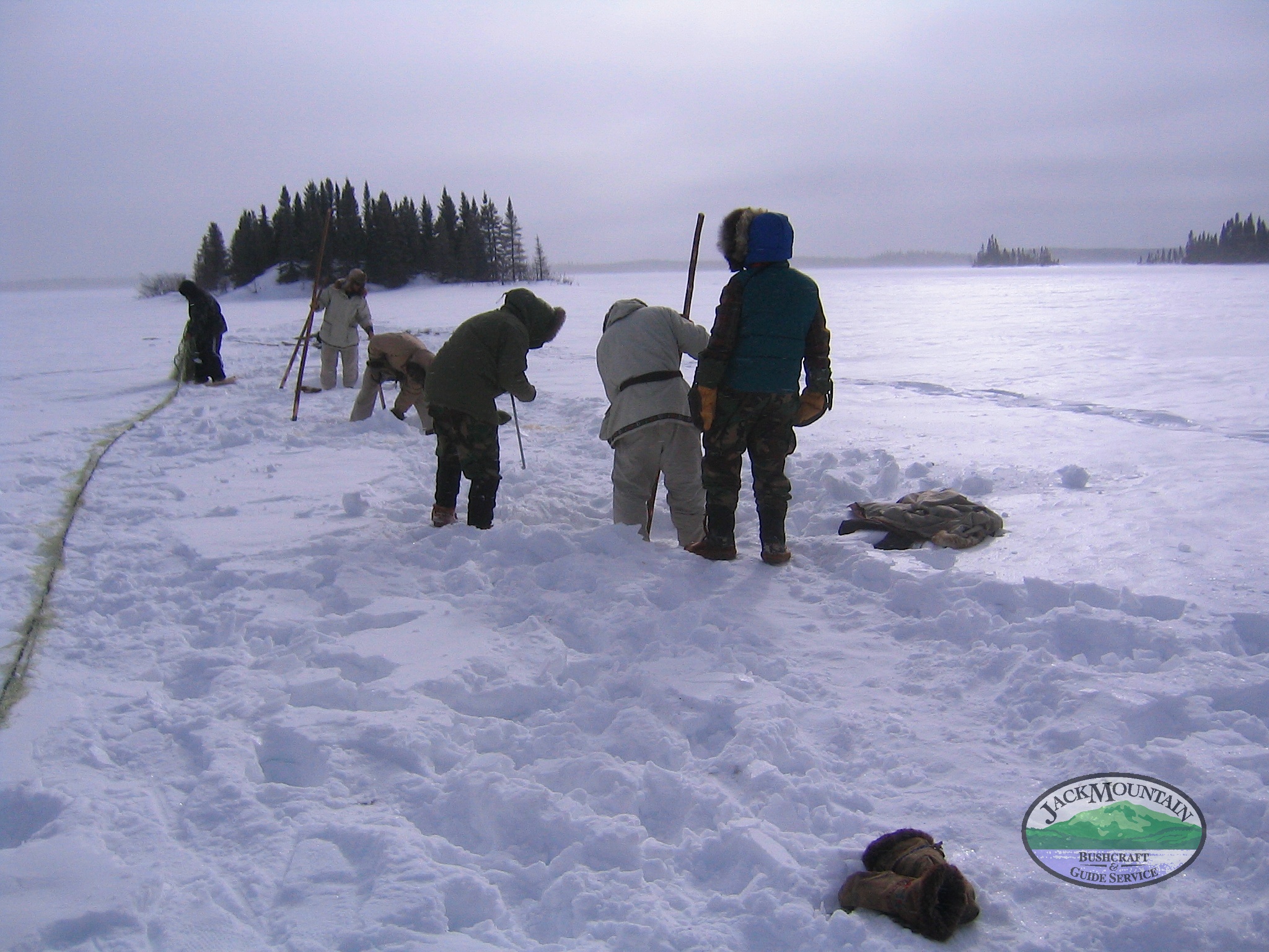 setting-a-gill-net-under-the-ice_3977302304_o